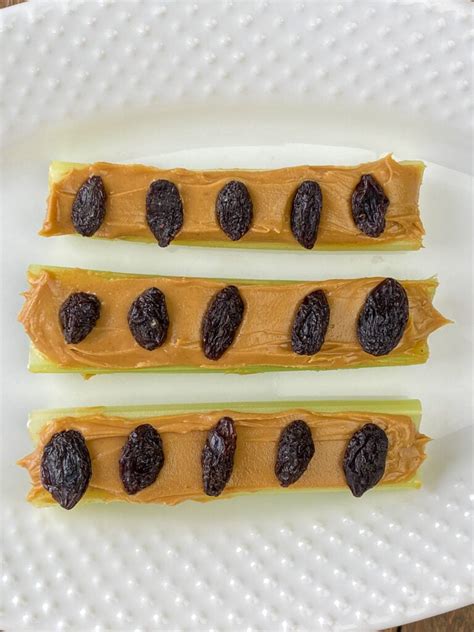 Saved View All Saved Items. . Celery topped with peanut butter and raisins crossword clue